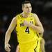 Michigan freshman Mitch McGary beats his chest at the bench in the first half against Syracuse in the Final Four in Atlanta on Saturday, April 6, 2013. Melanie Maxwell I AnnArbor.com